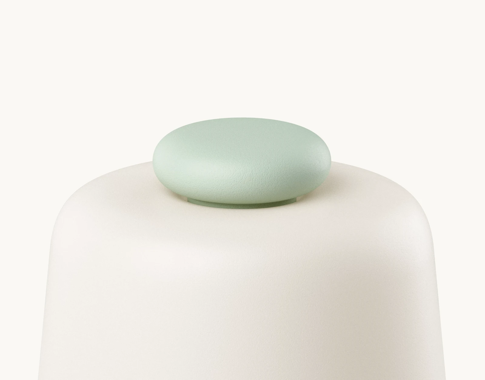 Closeup of top button on a Hatch Baby Mint