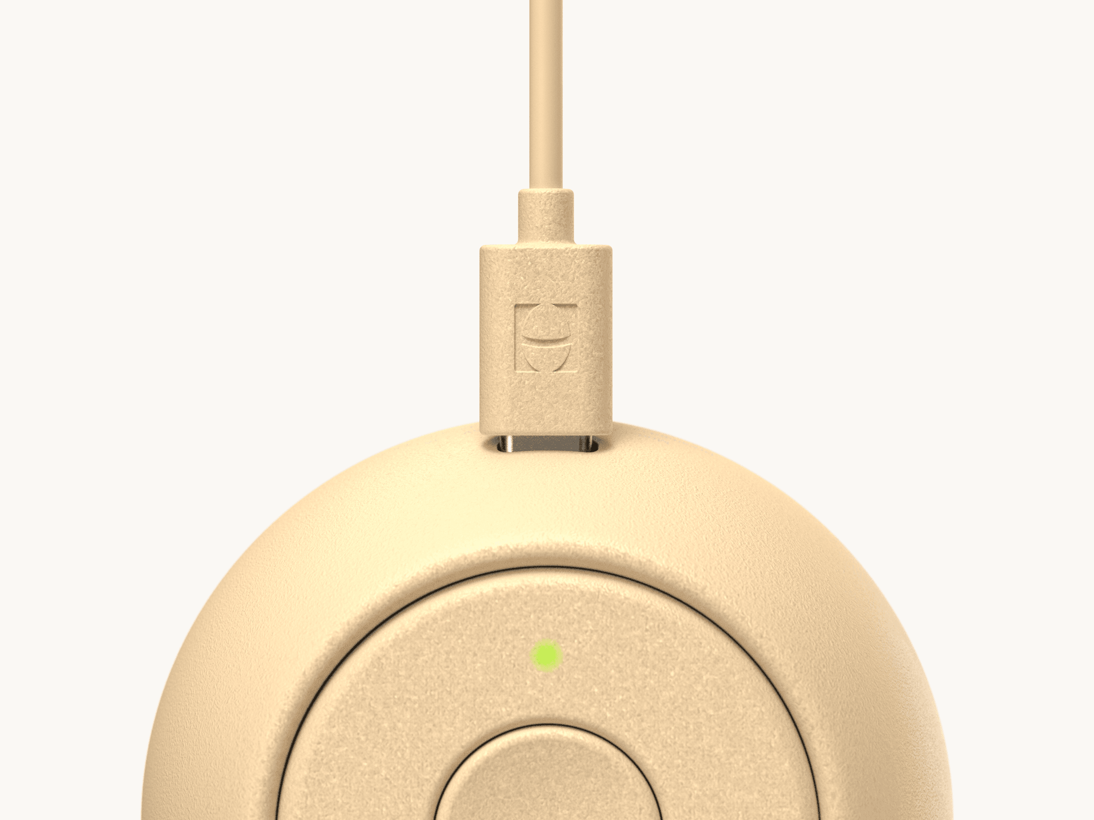 Hatch Go honey colorway with included charger plugged in