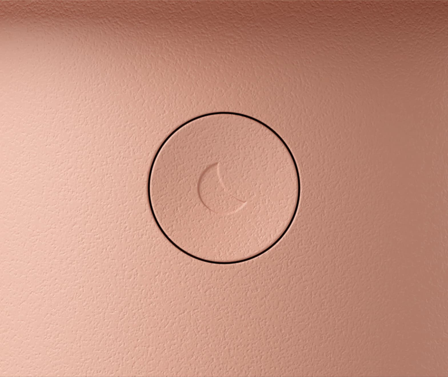 Closeup of back button on Hatch Baby peach colorway